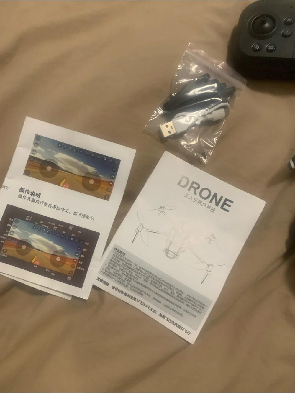 Black VR/Drone Controller with USB Cable and Spare Propellers